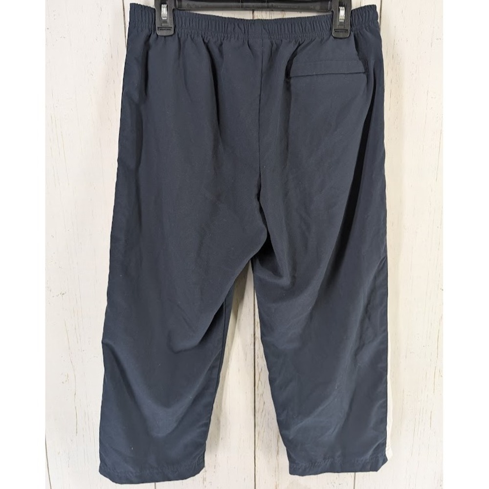 Under Armour Size Medium Dark Blue White Stripe Active Windbreaker Crop‎ Pants - Picture 7 of 7